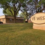 93 West building exterior sign